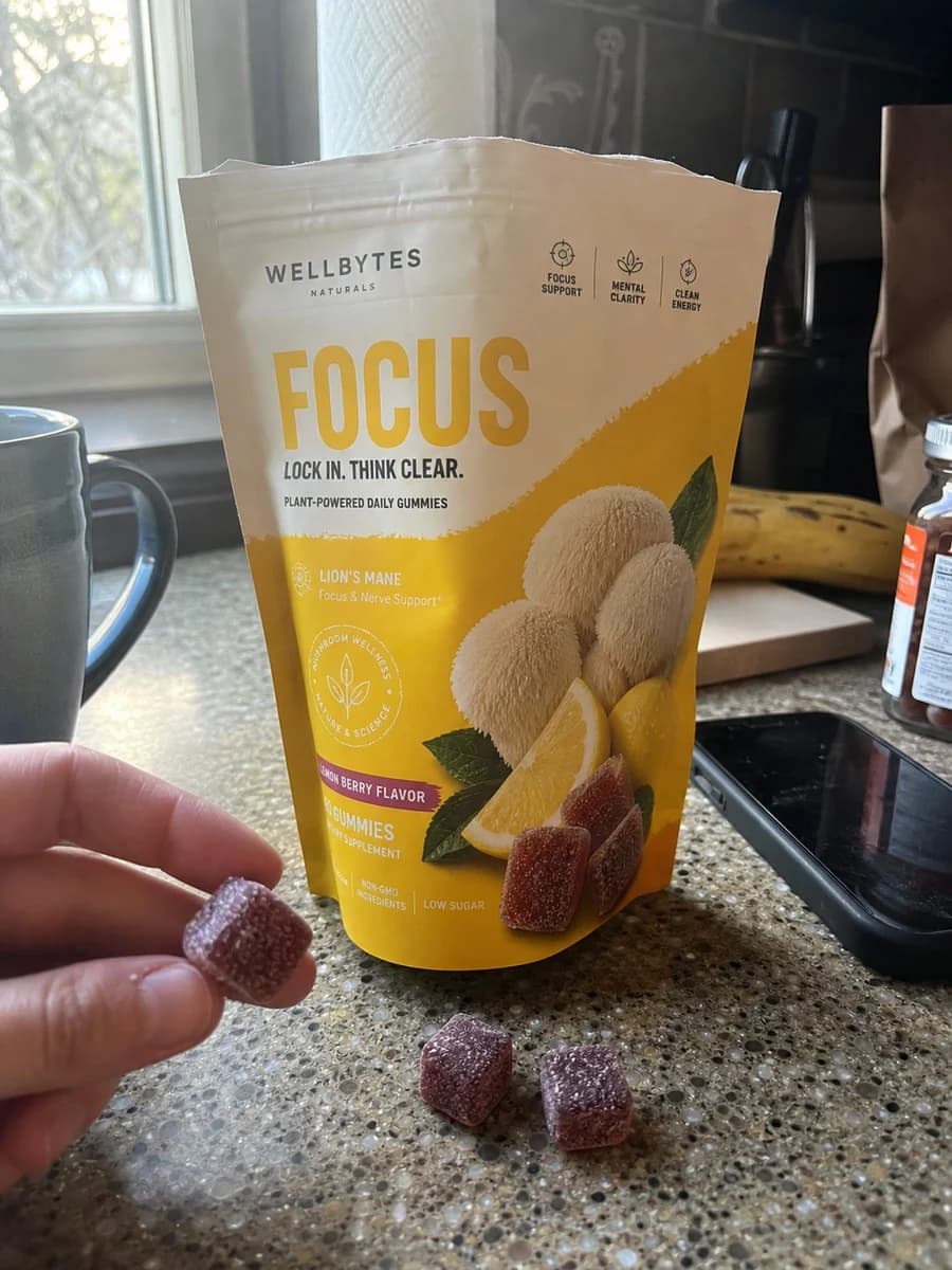Customer-style photo of the WellBytes Focus pouch on a kitchen counter