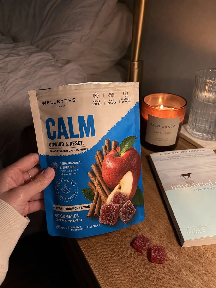UGC-style frame showing the current WellBytes Calm pouch design beside a nightstand